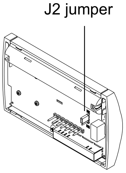 Location of the J2 jumper on the back of the thermostat baseplate